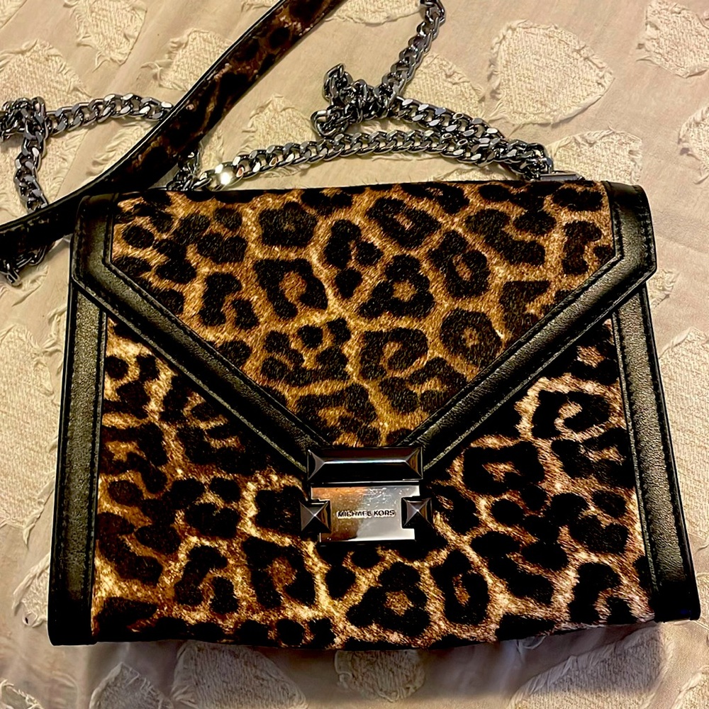 Michael Kors small crossbody.  W/ chain strap that doubles.  Outside pocket
